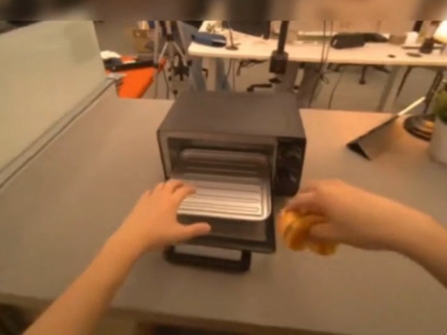 Bread moving toward the open oven